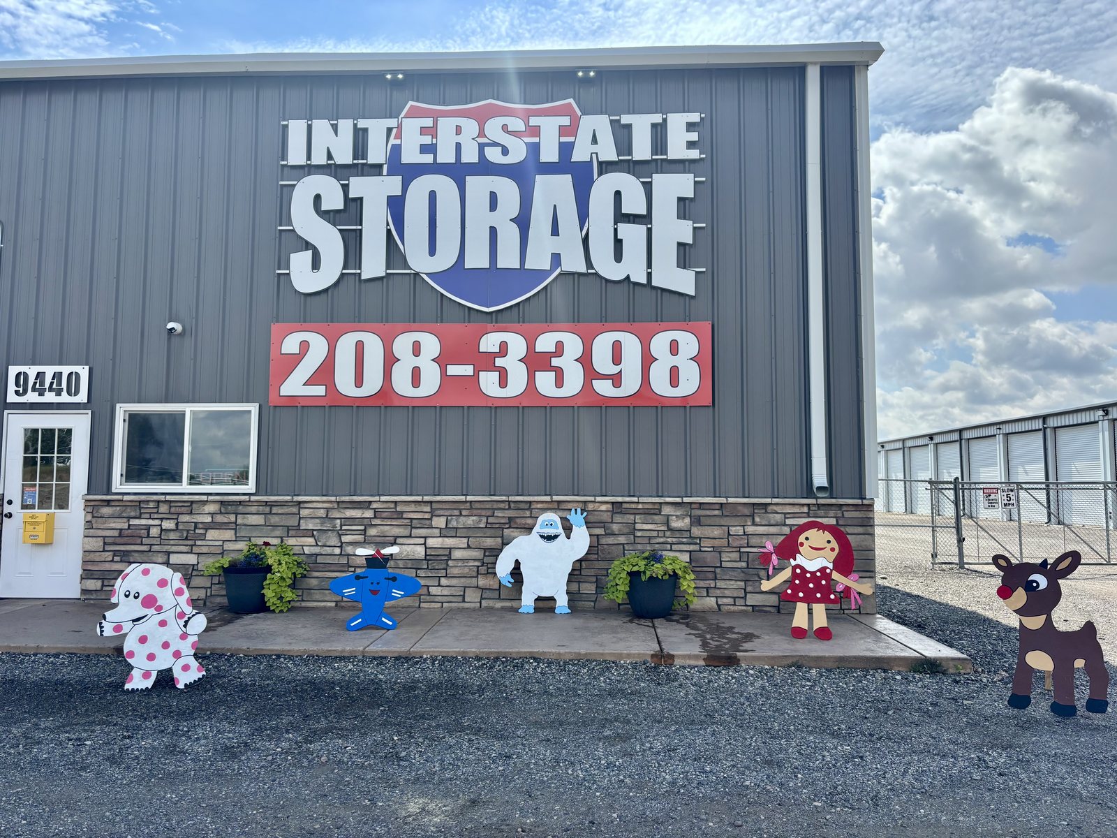 The Interstate Storage building with Misfit Toys character cutouts outside