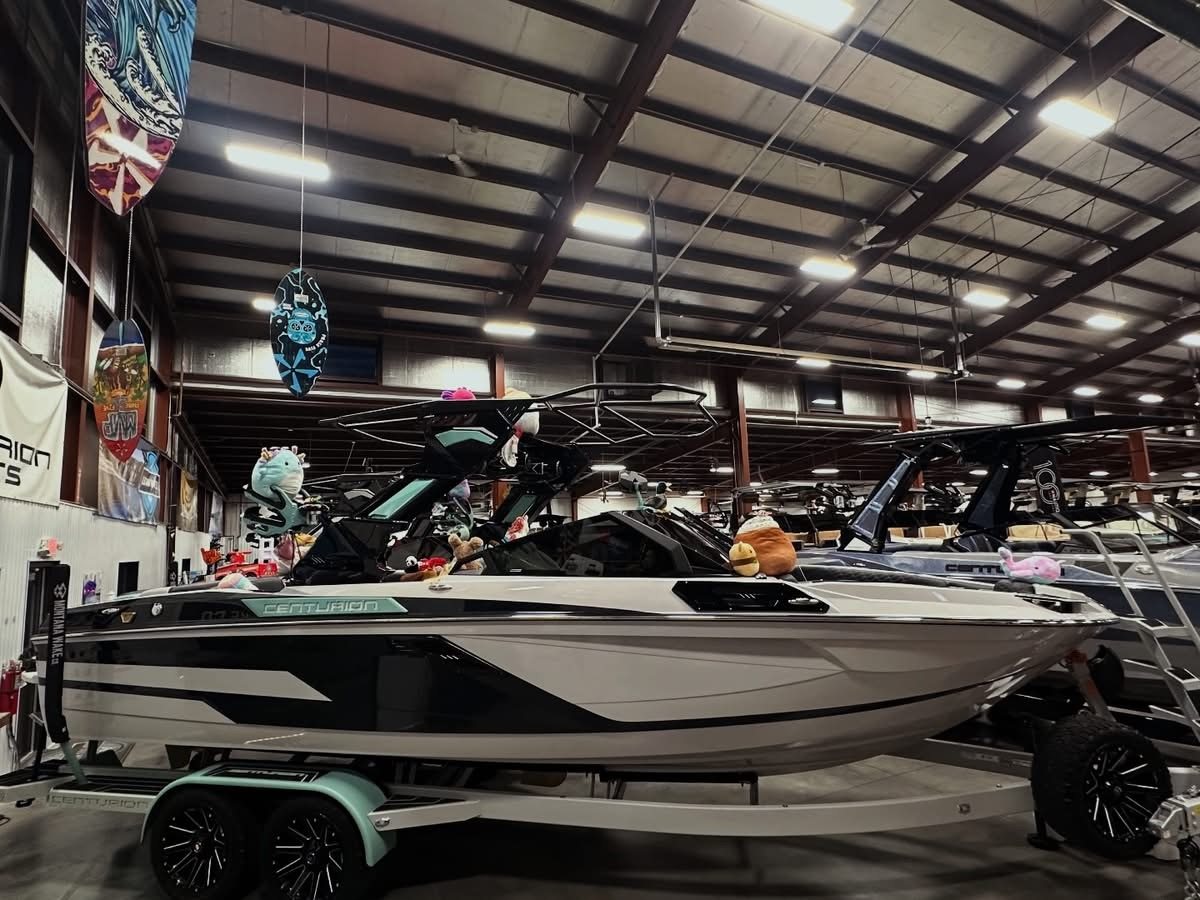 Donated toys arranged on a boat inside the Montana Wake Co showroom